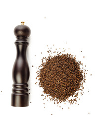 pepper mill and peppercorns heap, isolated on white