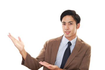 案内するビジネスマン