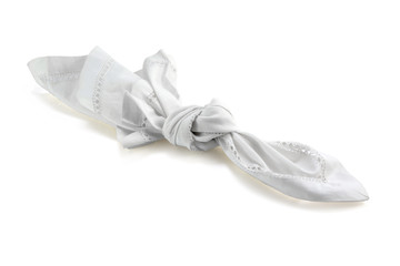 reminder, knot in handkerchief  isolated with shadow on white
