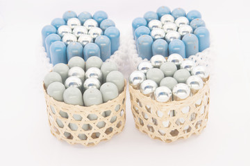 Stack of silver and blue gas container in basket