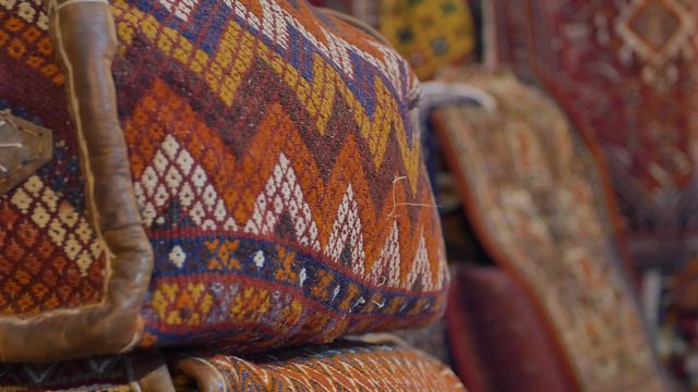 Colorful carpet carpets and textile in shop on the Vakil Bazaar, is located in the old city Shiraz centre.