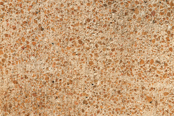 Concrete background of stones, orange
