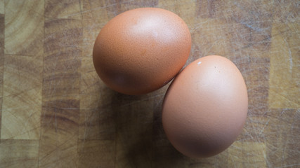Fresh eggs on a simple background,