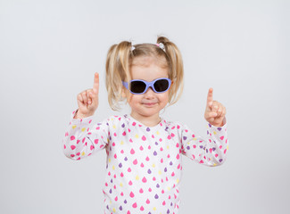 Little fashion girl in sunglasses