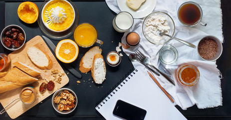 Obraz na płótnie Canvas Healthy Breakfast Black Table Top View Assortment