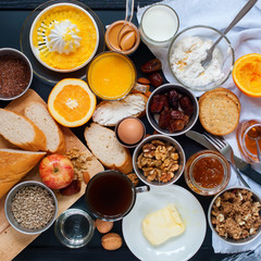 Healthy Various Assortment Set Breakfast Toast Egg Nut Butter Milk Orange Juice Black Table Top View