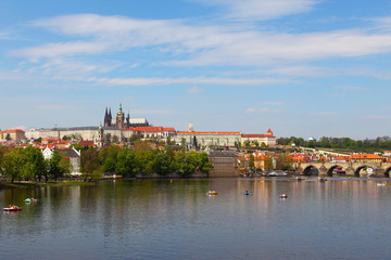 Fototapeta na wymiar View of Charles Bridge and Prague Castle from the river Vltava, Czech Republic