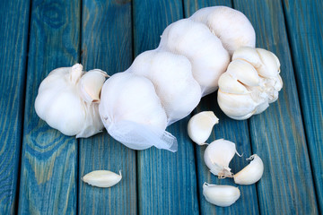 Fototapeta na wymiar Garlic on wooden table