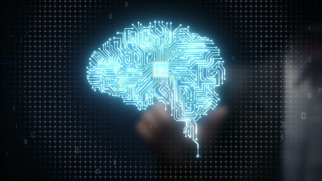 Businessman touching Brain CPU chip, grow artificial intelligence