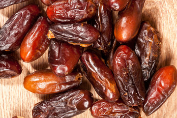 Dried fruits on wooden background