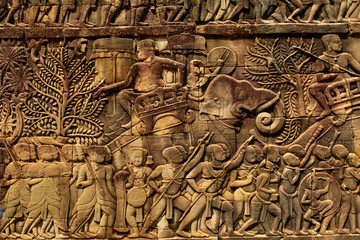 Cambodia Architecture. Bas-relief , Wall Carving Of Prasat Bayon Temple In Angkor Thom, At Angkor Wat Complex. Scene Of Marching Army, Khmer Culture. Famous Landmark. Tourism. Ornament Background