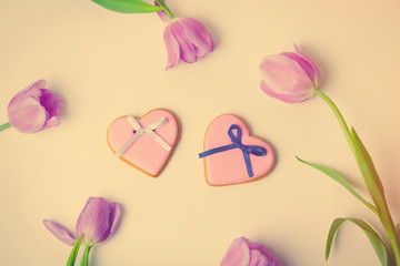 tulips and cookies on the white background