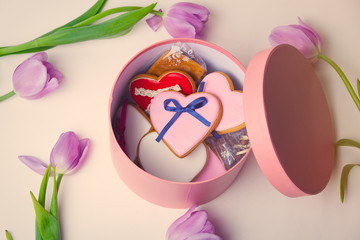 tulips, cookies and present-box on the white background