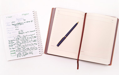 Naklejka premium two notebook for rewriting the recipe on a white background