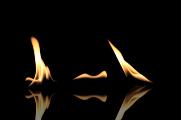 Burning flames isolated on a black background.