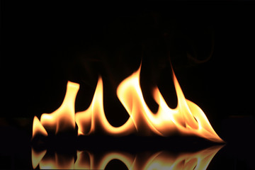 Burning flames isolated on a black background.