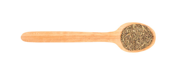 Provence herbs in a wooden spoon on a white background