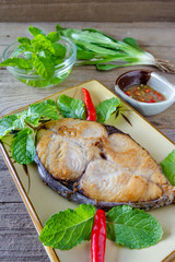 King mackerel steak on wood background,fried fish