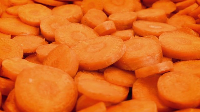 Cut Carrot Pieces Rotating Closeup