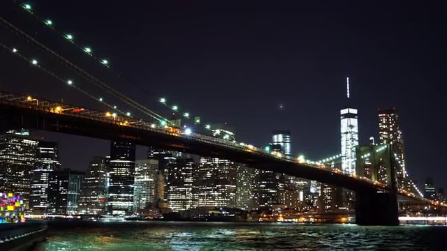 Brooklyn Bridge in front of Manhattan skyline at night  - MANHATTAN, NEW YORK/USA   APRIL 25,  2015