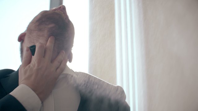 man using perfume, Hamming and laughs