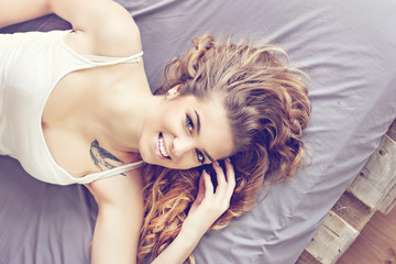 Portrait Beautiful woman lying on the bed