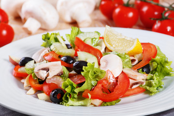 Fresh vegetable salad on the wooden table