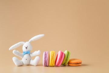 Colorful macaroons on beige