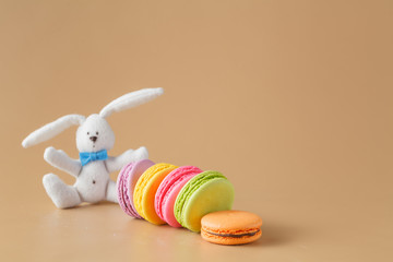 Colorful macaroons on beige