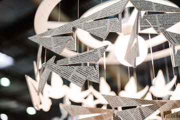 lamp decorated with white paper plane