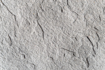Grey  rugged stone background horizontal