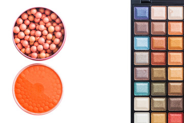 Colorful eye shadows palette with makeup brush.