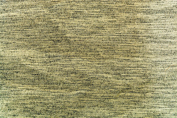 texture of interwoven black and beige threads