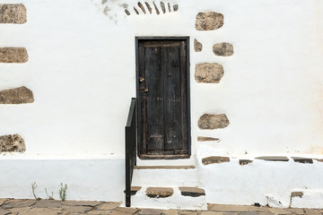 Old black door in Betancuria village on on Fuerteventura, Canary Islands, Spain