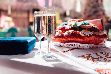 Wedding glasses filled with champagne at banquet