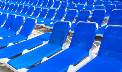 Fototapeta premium Many blue deck-chairs
