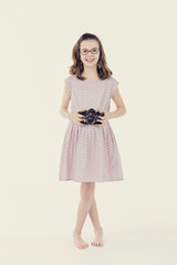 Chil with photo camera