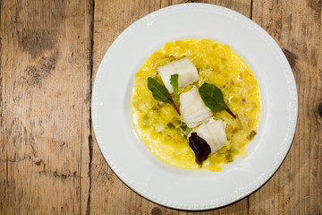 Lemon sole with leek saffron fondue from above. Sole Fillet with leek & saffron 