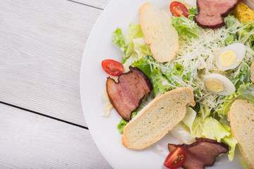 Caesar salad with bacon