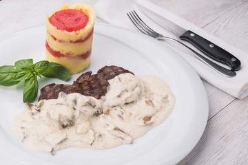 roasted medallions with mushroom sauce