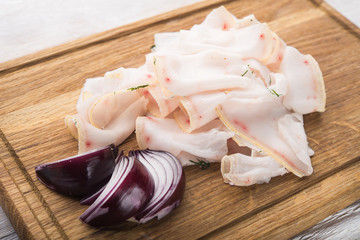 Fototapeta na wymiar fat tallow sliced with onion