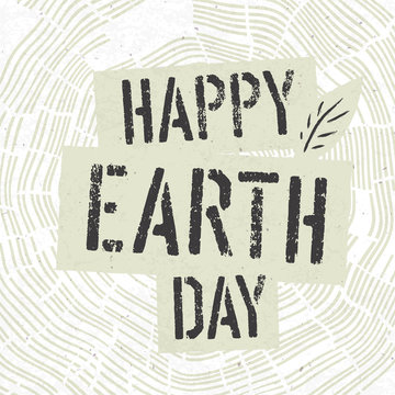 Happy Earth Day Logotype on Tree Rings Background. Template for