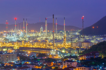 Fototapeta na wymiar Oil refinery with tube and oil tank along night sky at Si Racha District, Rayong Province, Thailand