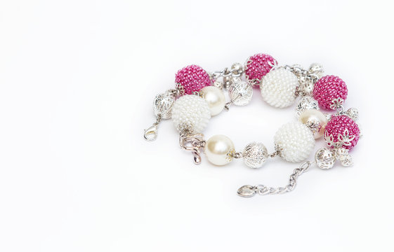 Pink and white beaded bracelets