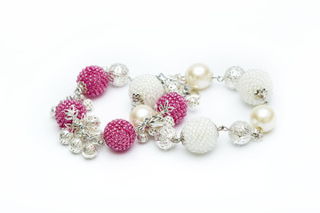 Pink and white beaded bracelets