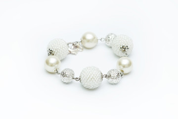 White beaded bracelet isolated