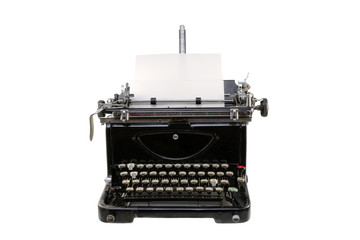 Old germany type writer with paper sheet isolated on white