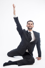 Young male performing yoga