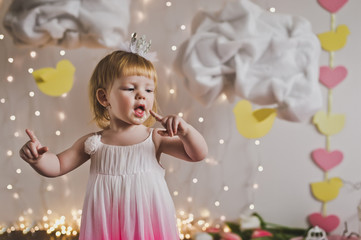 The girl licks the finger after sweets 5420.