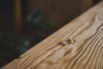 Gold wedding rings on the boards 5615.